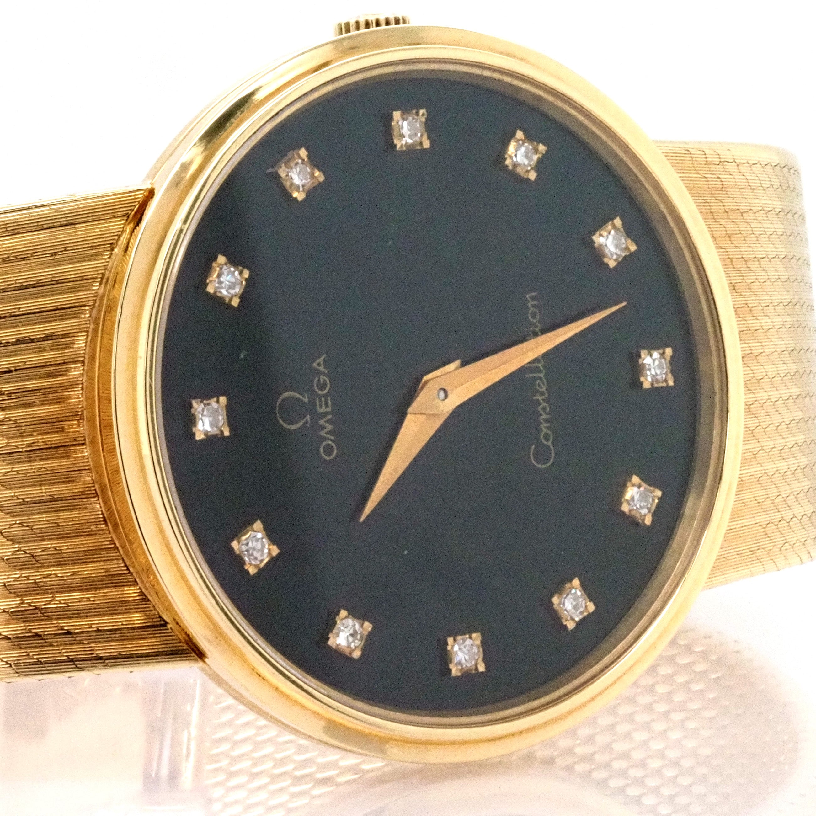 Omega 18ct store gold watch